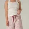 Conjunto pijama calado blanco y rosa de algodón orgánico, de Comazo Earth 02
