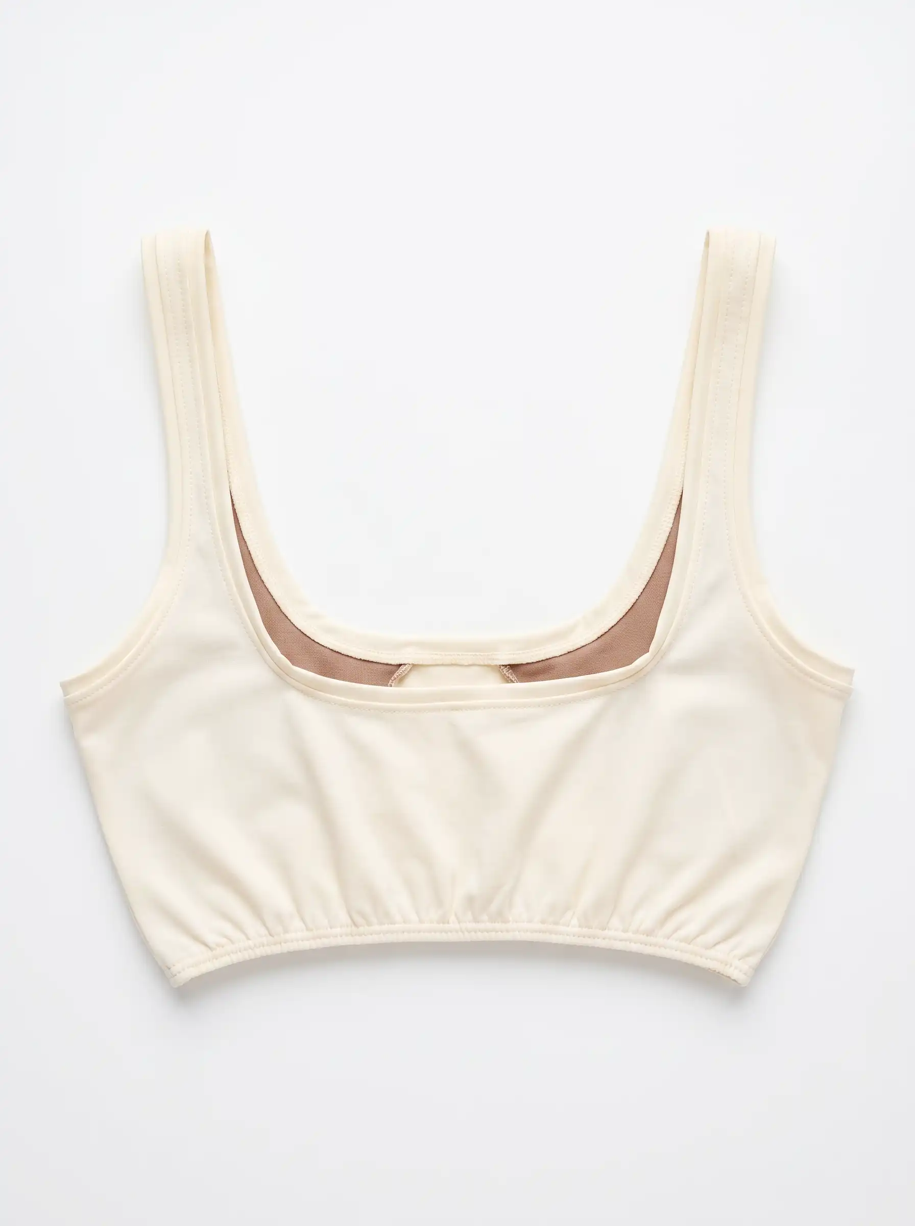 Top de bikini rosa nude y vainilla de poliamida reciclada, de Lilah flat lay 02